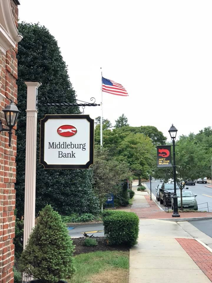 bank with flag flying out front