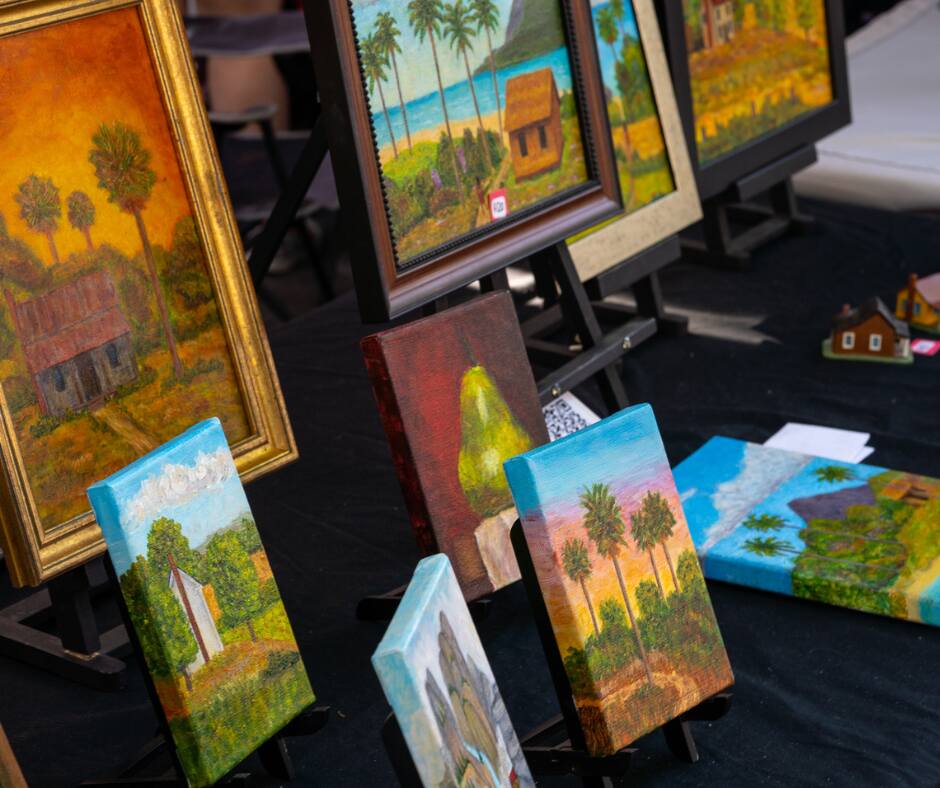 display of canvas and paintings